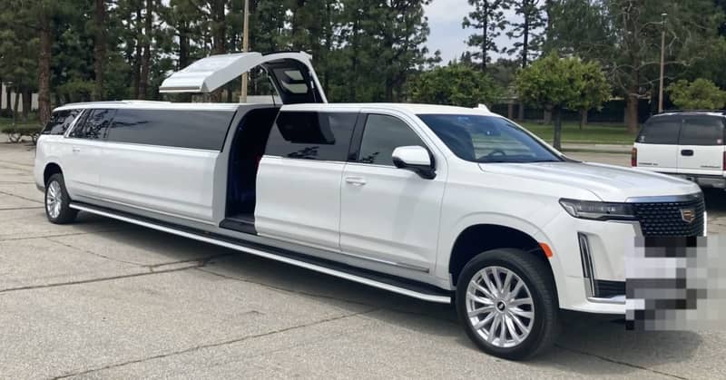 white Cadillac Escalade stretch limousine rental Dallas